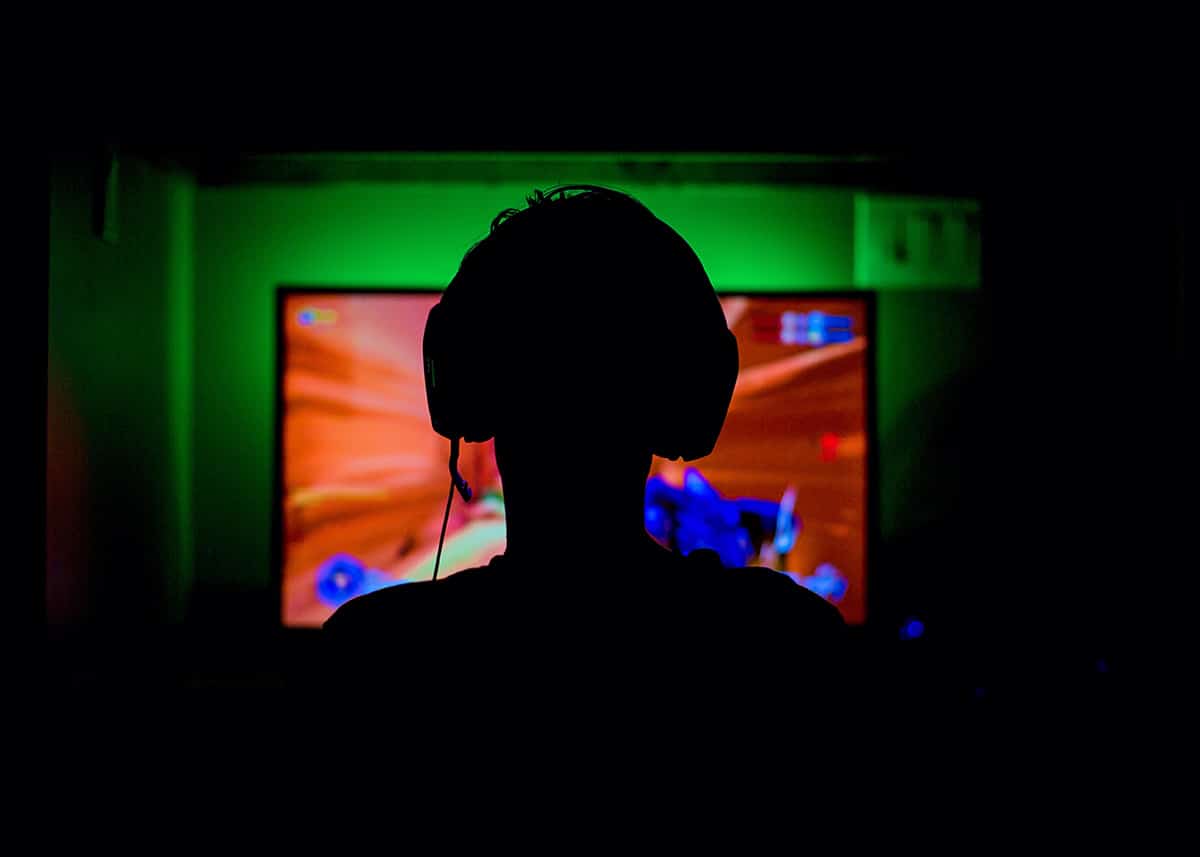 Gamer at PC in the Dark